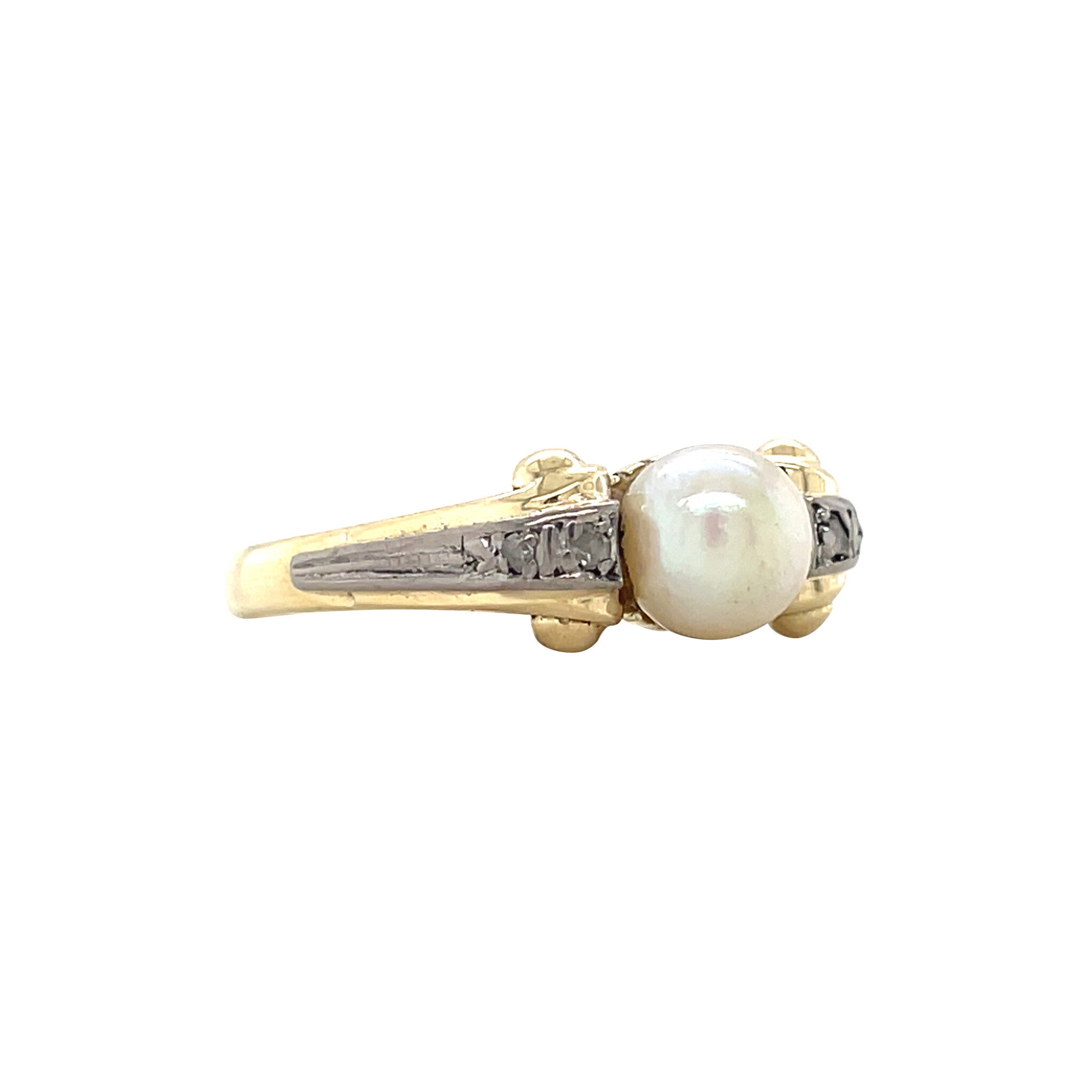 Gouden vintage ring met parel en diamant 14 krt