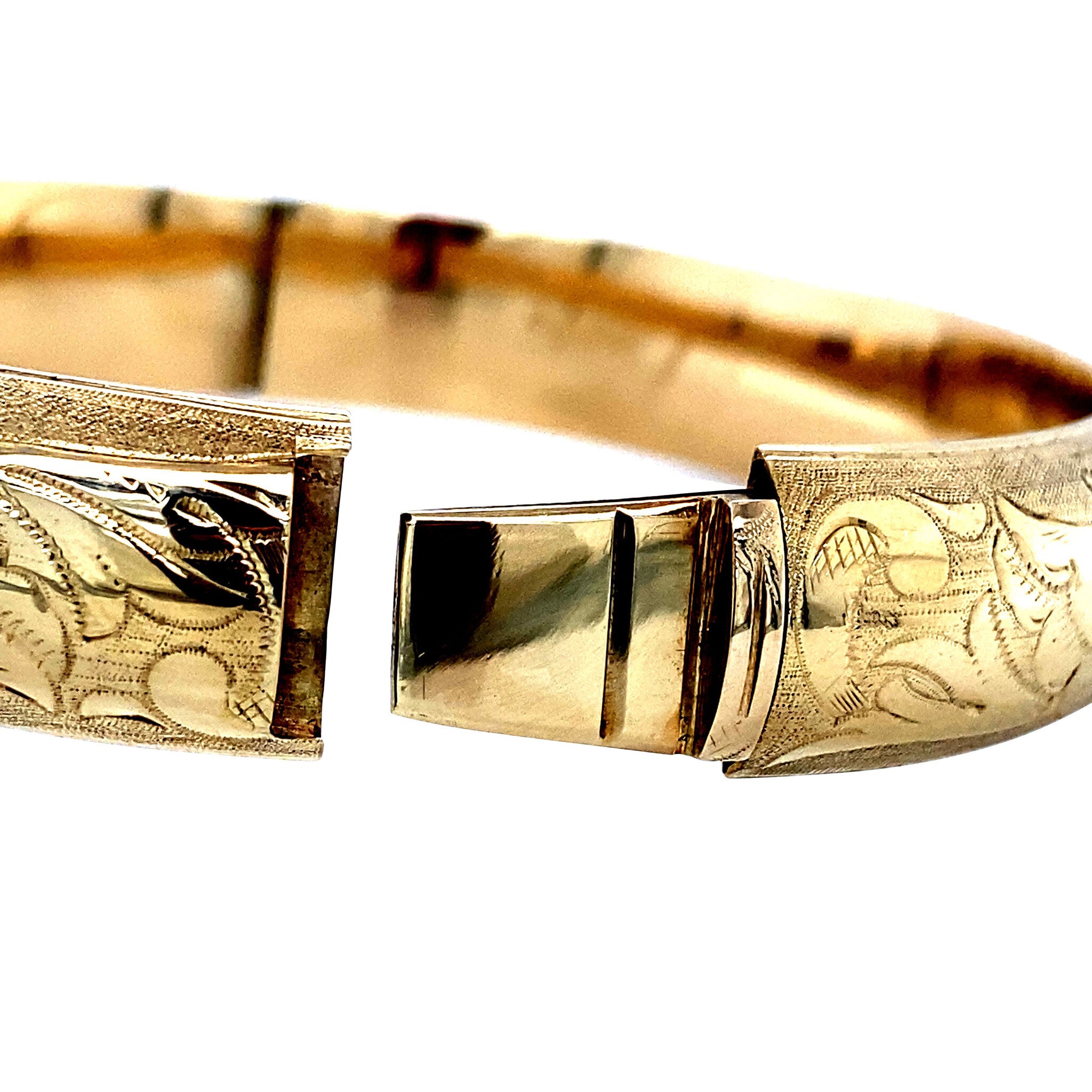 Gouden vintage bangle met gravure 14 krt