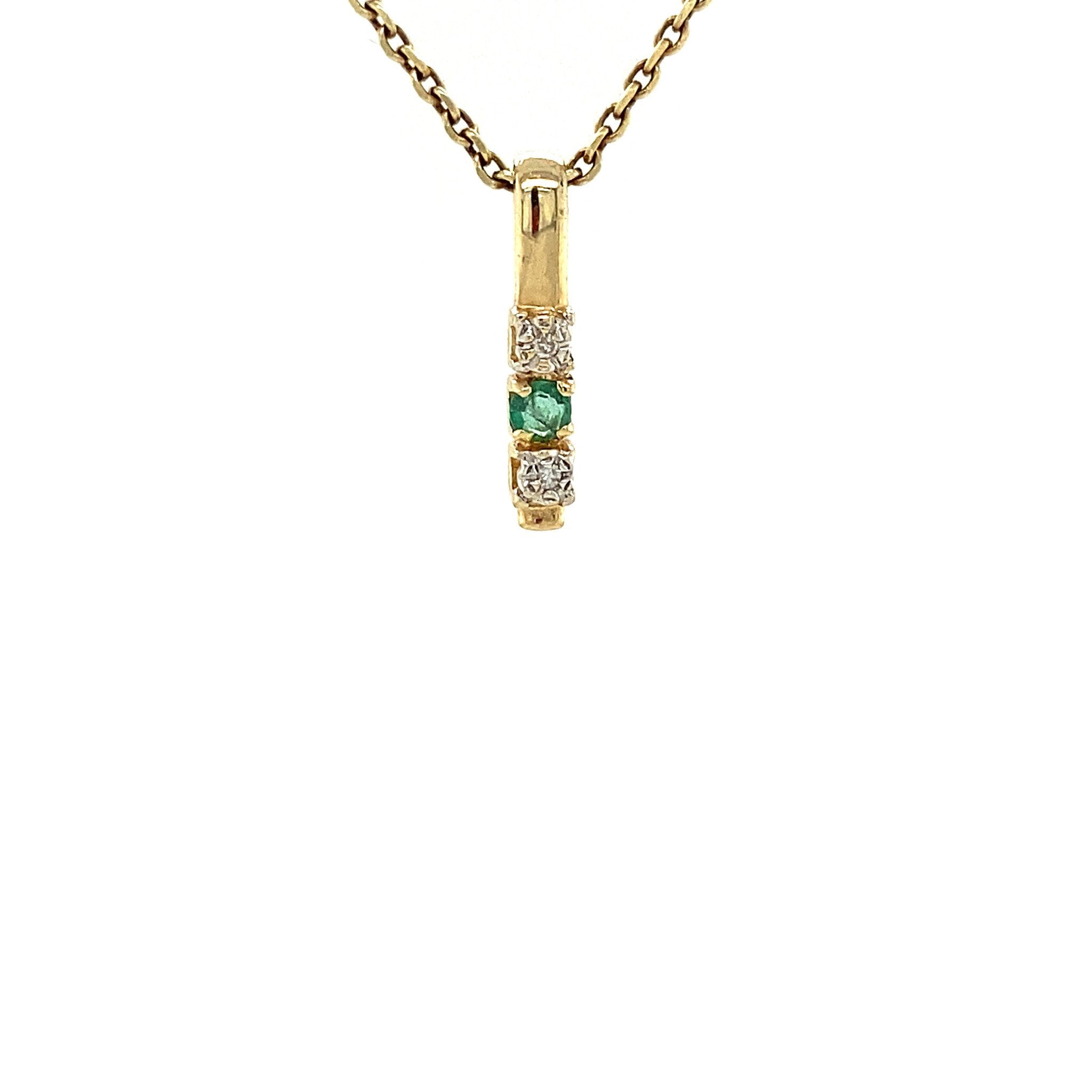 14 kt gold pendant with emerald and diamond