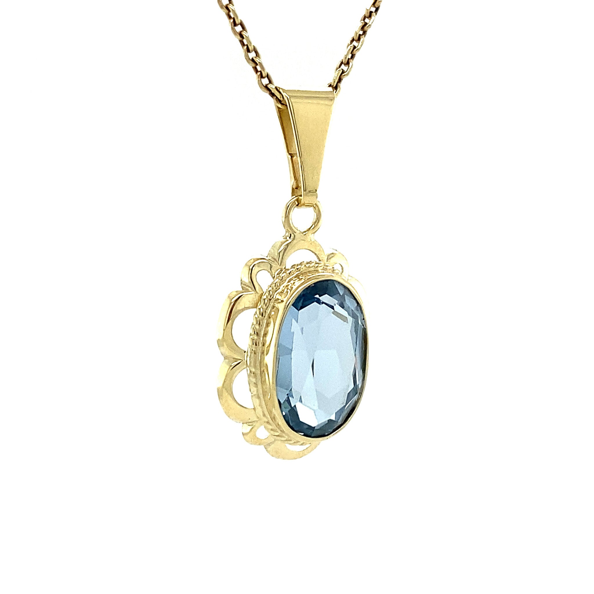 Gouden hanger met blauwe spinel 14 krt