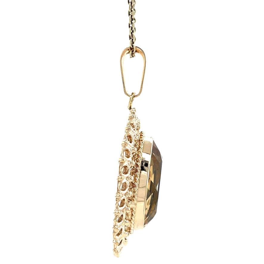 Vintage 14 kt gold pendant with citrine.