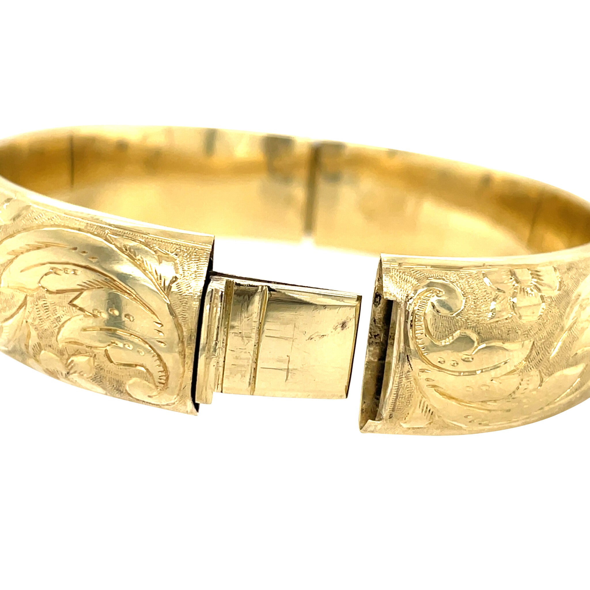 Gouden vintage bangle met gravure 14 krt