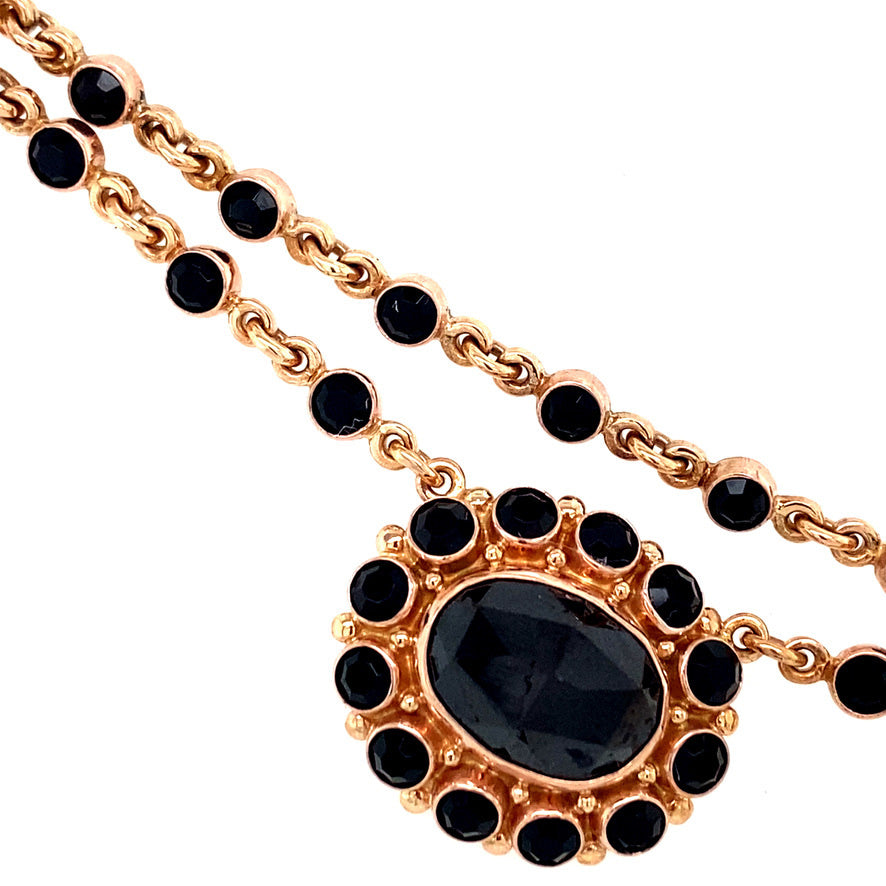 Gold vintage necklace with garnet 14 krt