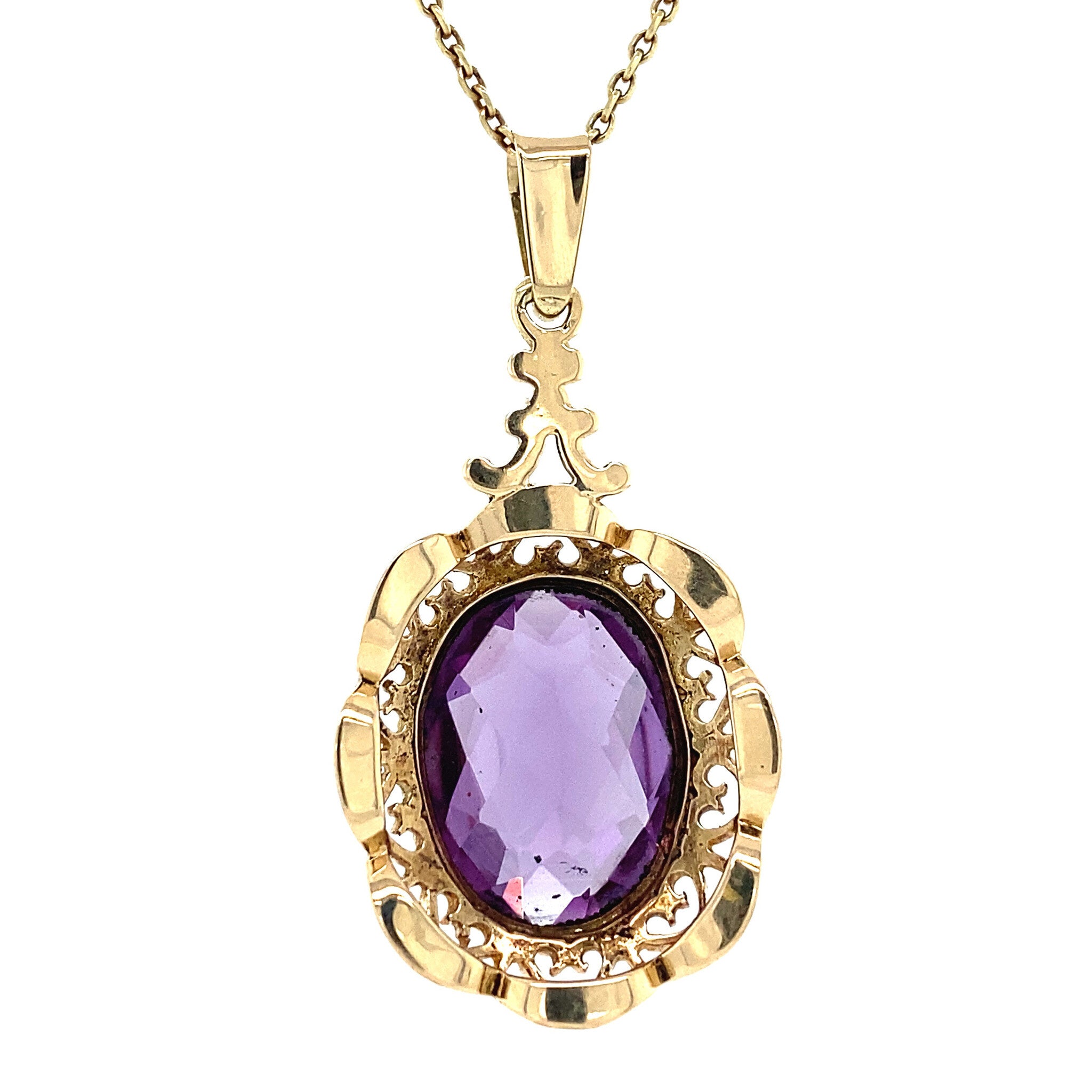 14 kt gold pendant with purple sapphire