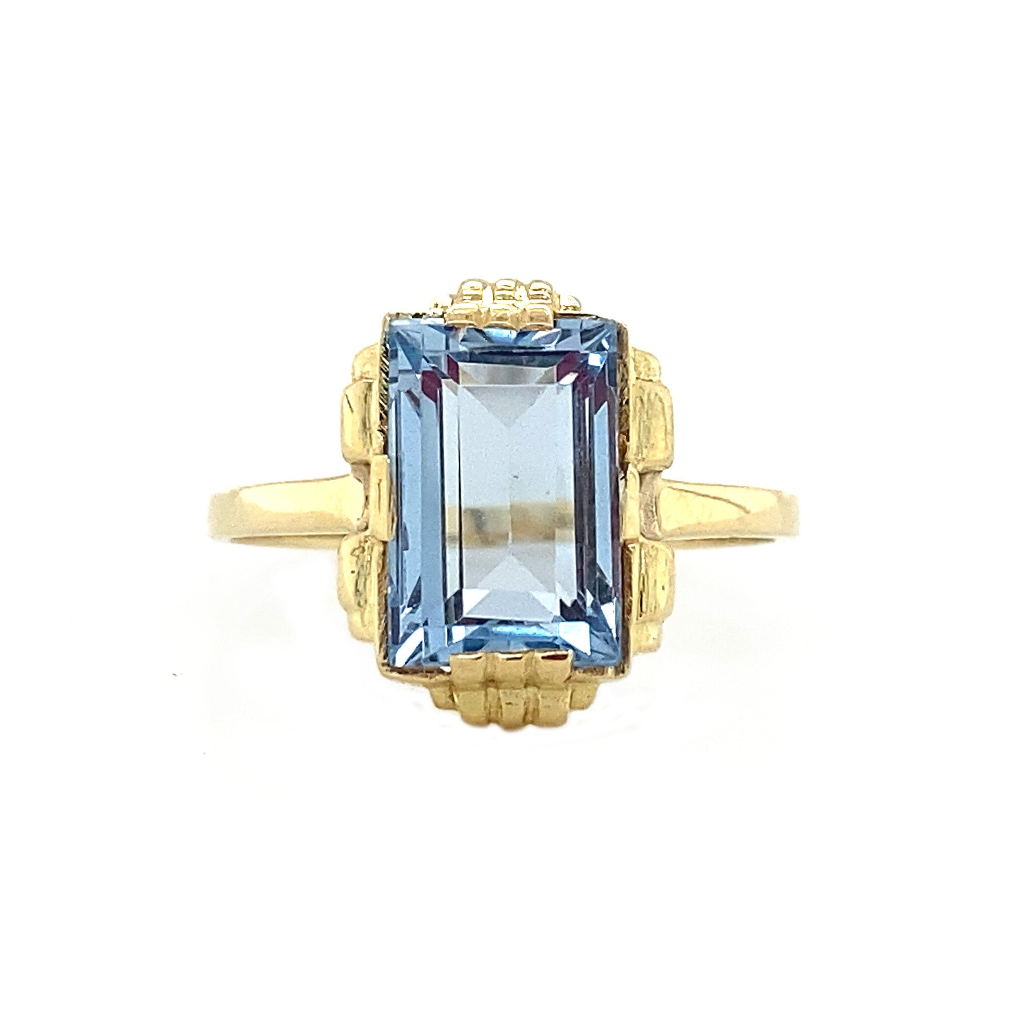 Gouden ring met blauwe spinel 14 krt