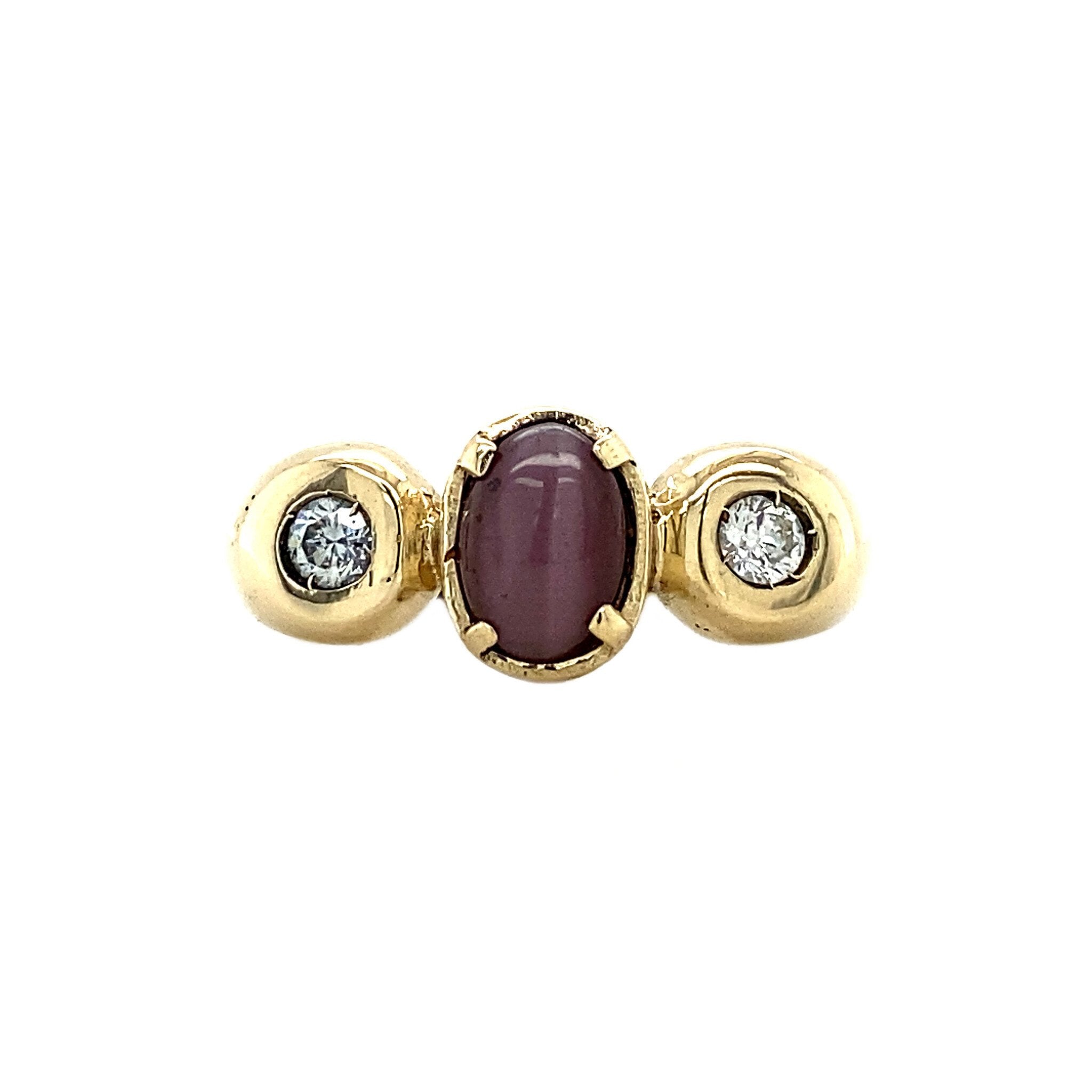 14 kt gold ring with sapphire and zirconia