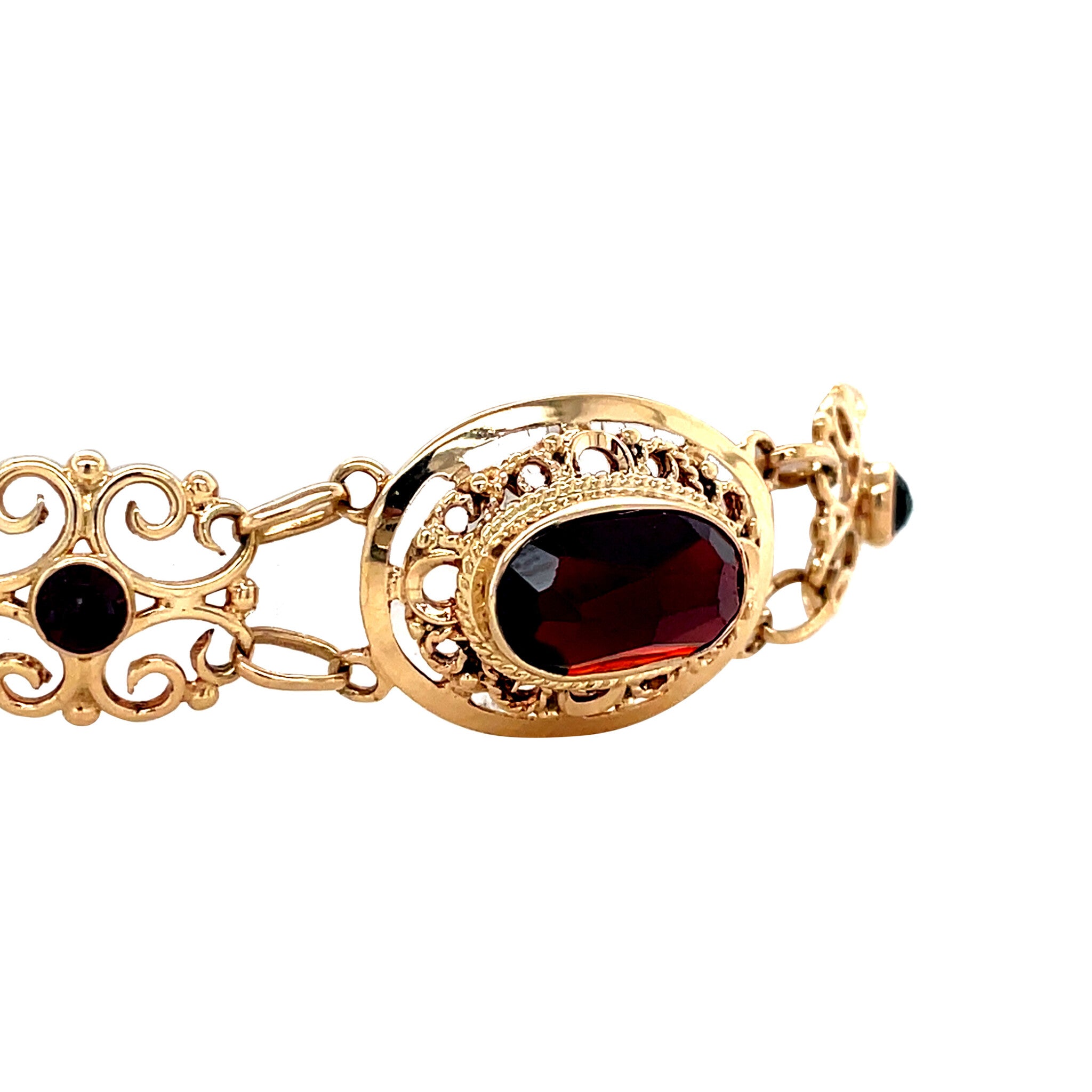 Vintage gold booties bracelet with garnet, 14 kt