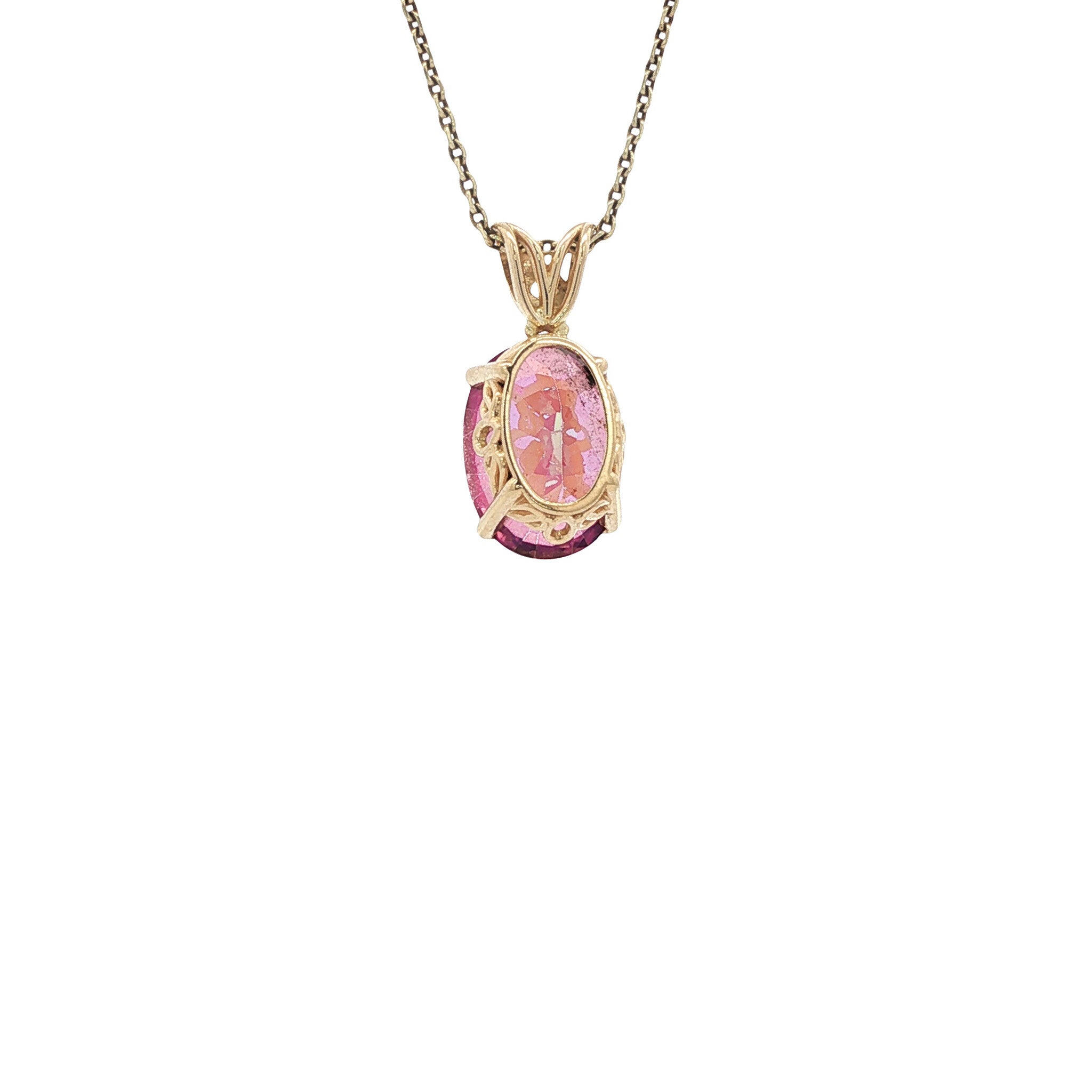 Gold pendant with a mystical topaz 14 kt