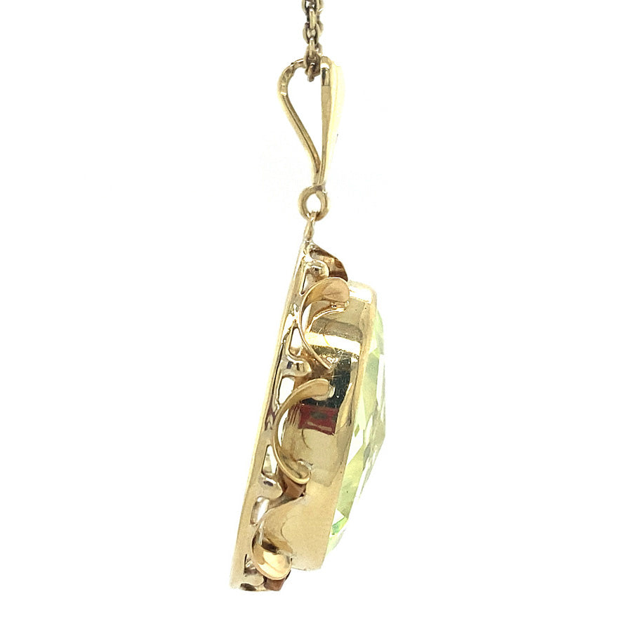 Gold pendant with green spinel 14 kt