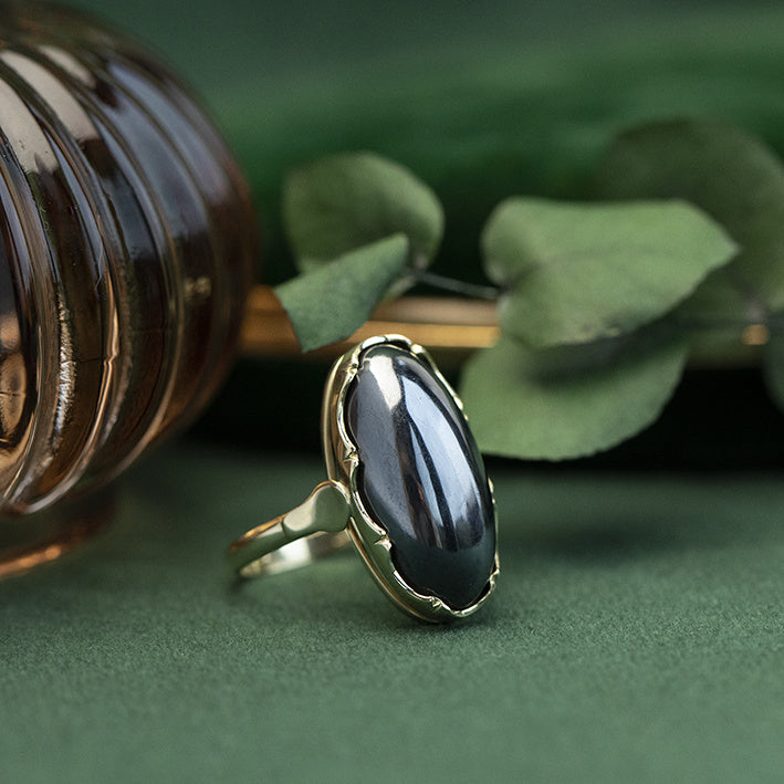 Gouden ring met hematiet 14 krt