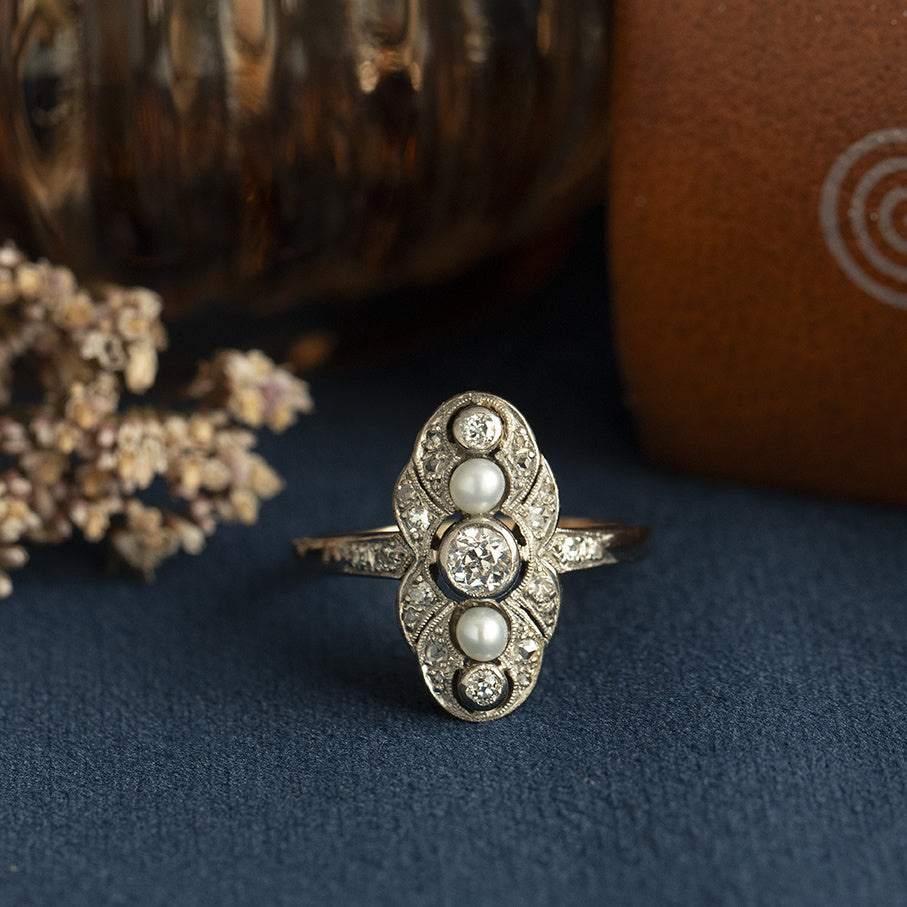 Gouden vintage ring met parel en diamant 14 kt