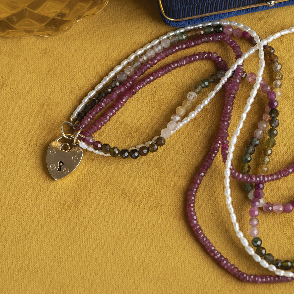 Ruby, tourmaline and pearl necklace with heart clasp, 41 cm, 9 kt