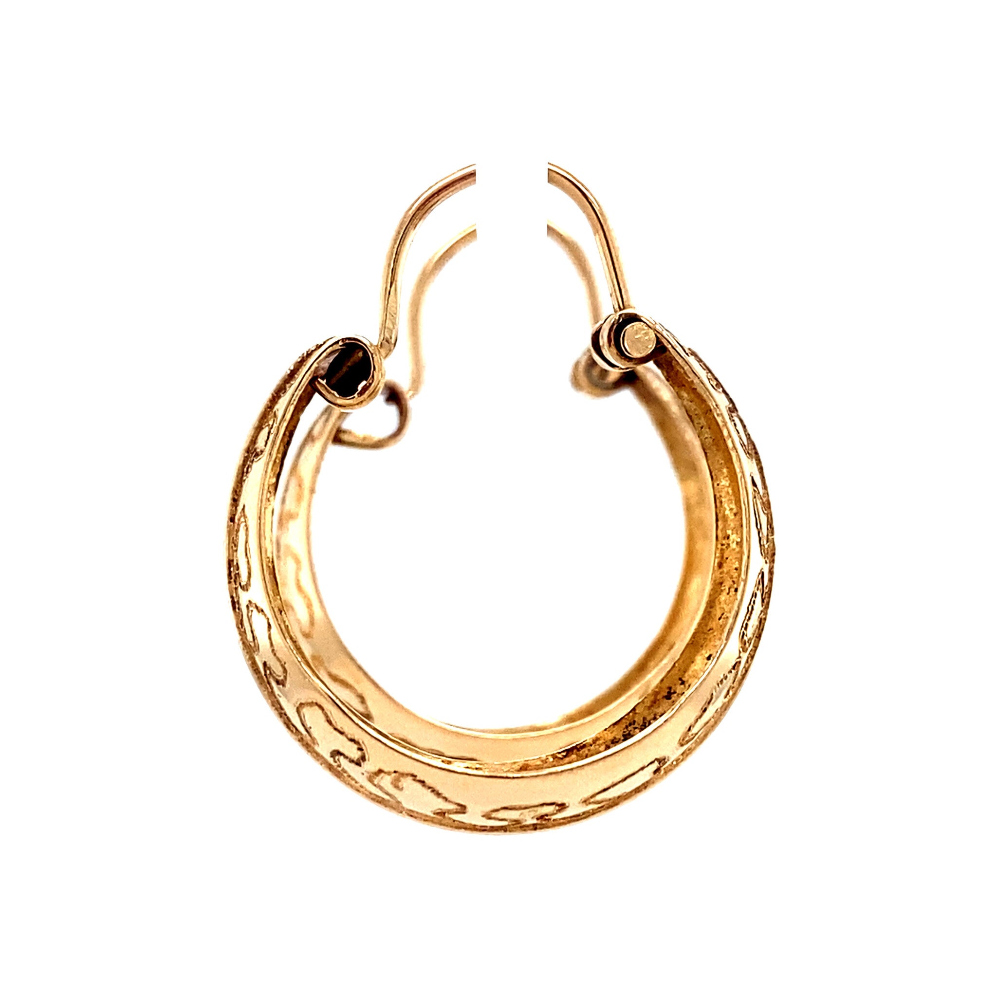 Gouden fantasie oorringen 18 krt