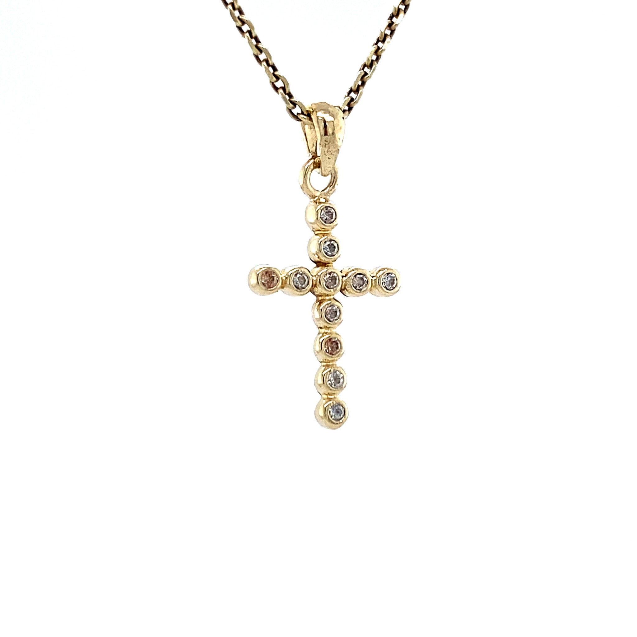 14 kt gold cross pendant with diamond