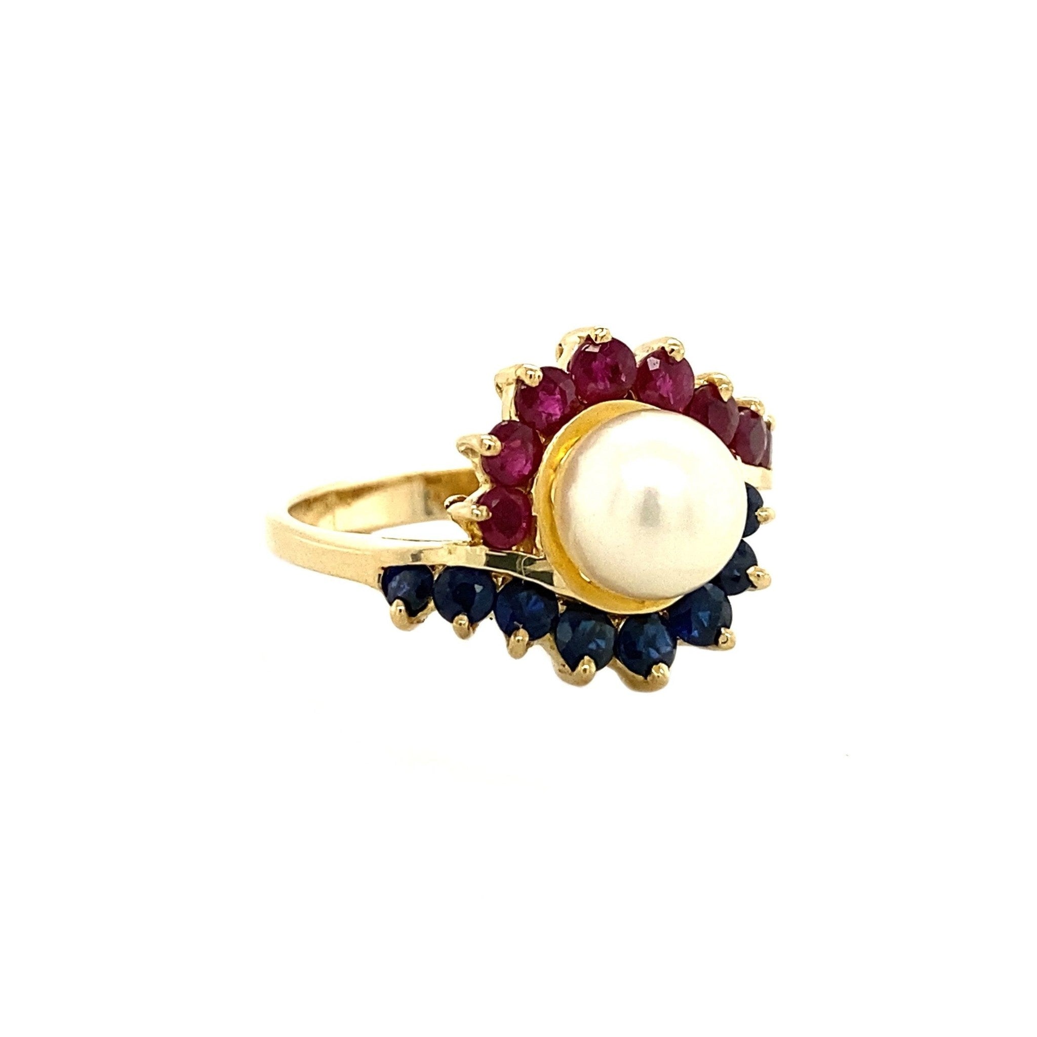 Gouden ring met saffier, robijn en parel 14 krt