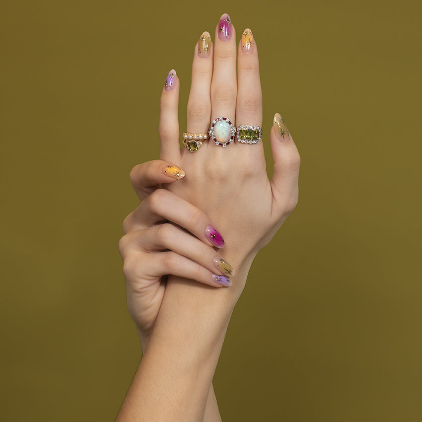 Gouden ring met peridoot en diamant 14 kt