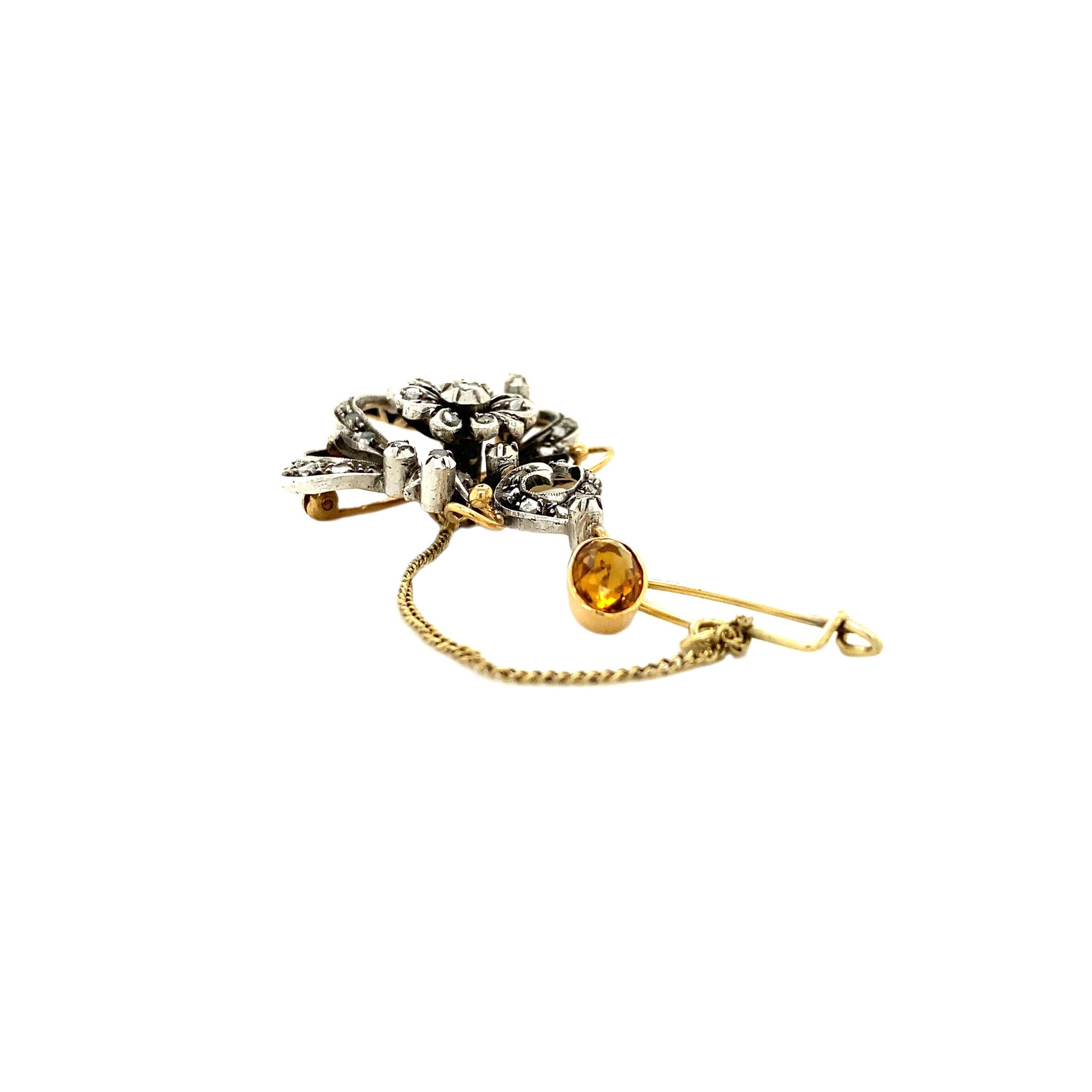 Gold brooch with rose-cut diamond set in silver, 14 kt/925
