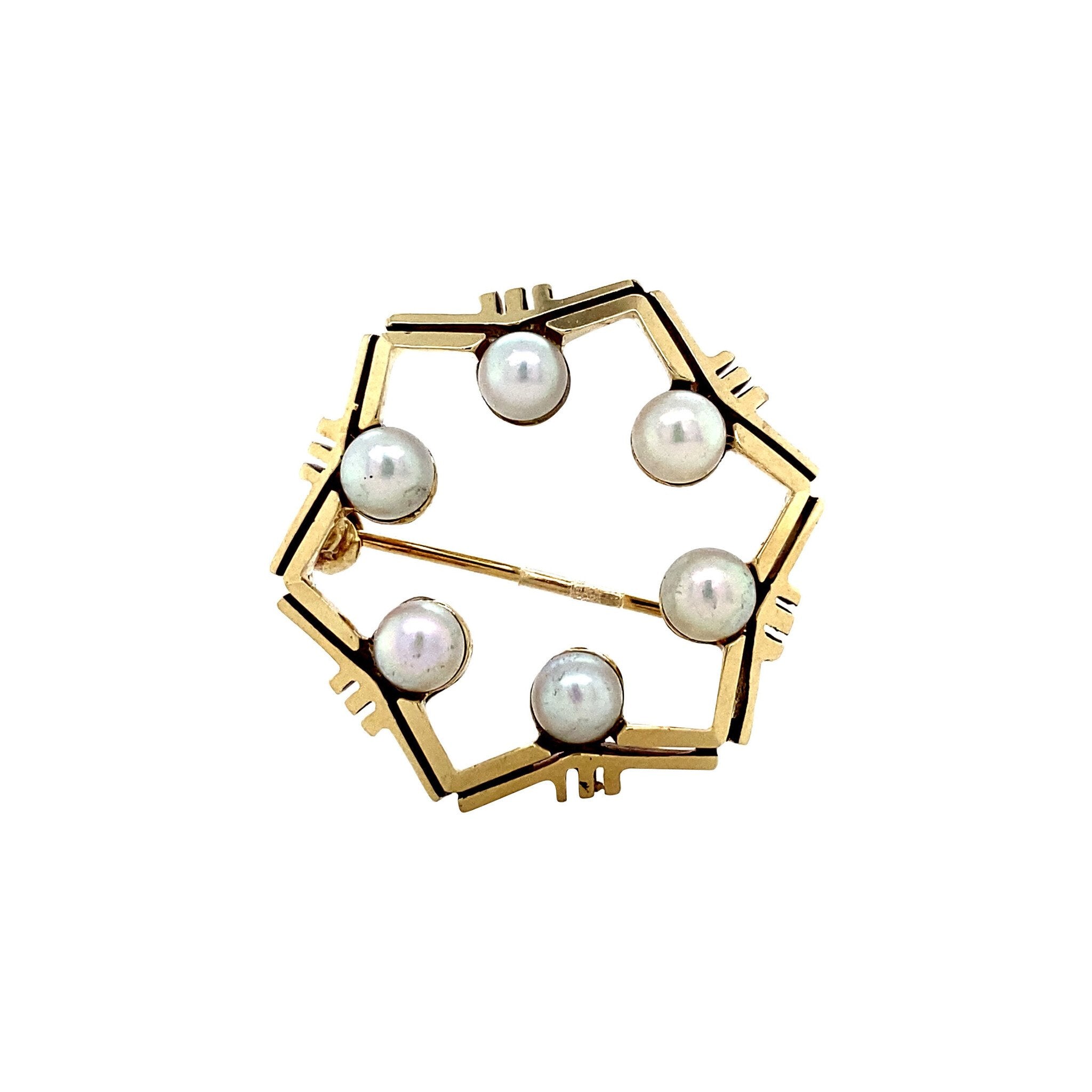 Gouden broche met parel 14 krt