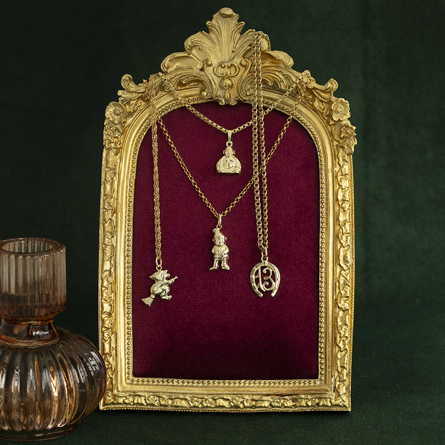 Gouden vintage hoefijzer nummer dertien hanger 14 kt