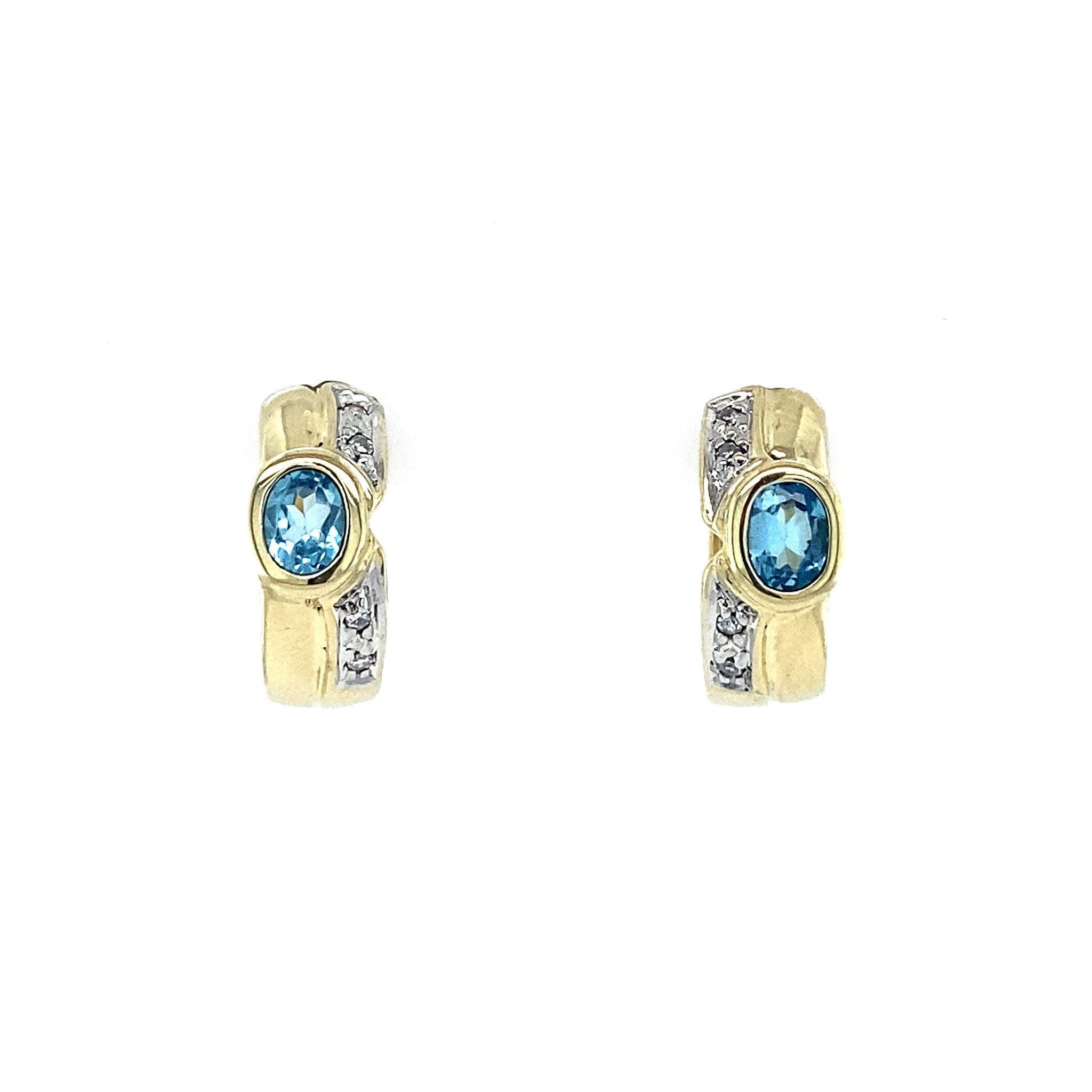 Gold hoop earrings with diamond and topaz, 14 kt