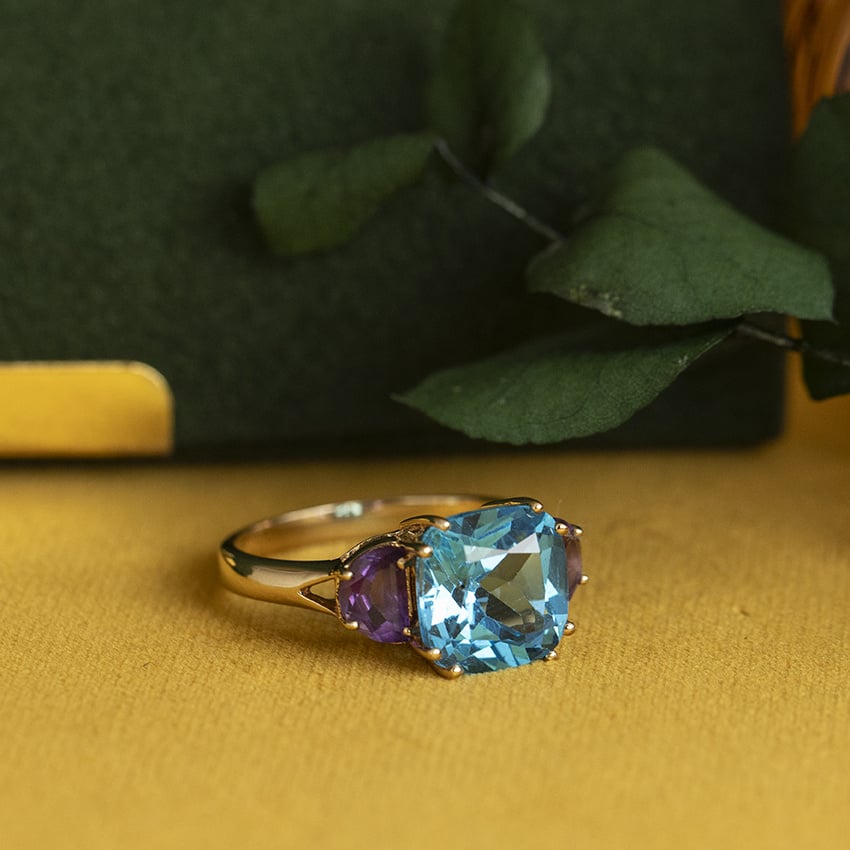 Gouden vintage ring met topaas en amethist 14 kt