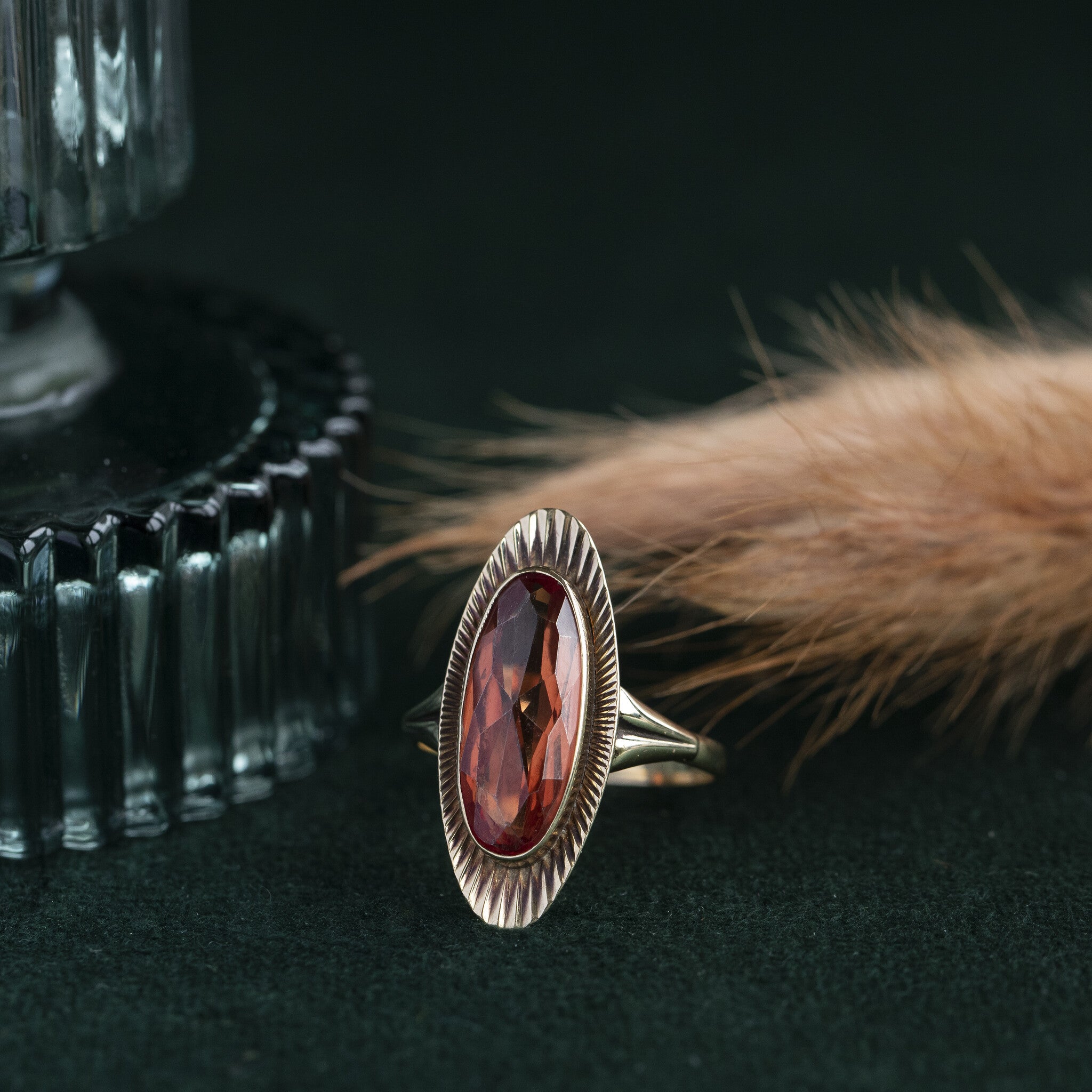 Gouden ring met oranje saffier14 krt