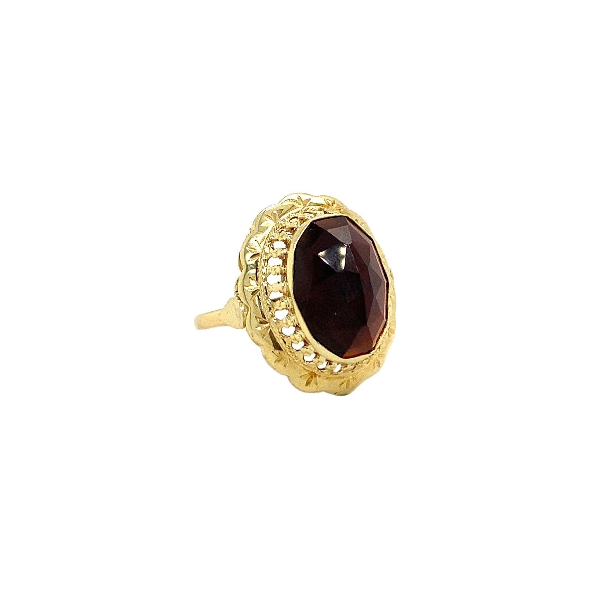 Gouden ring met granaat 14 krt