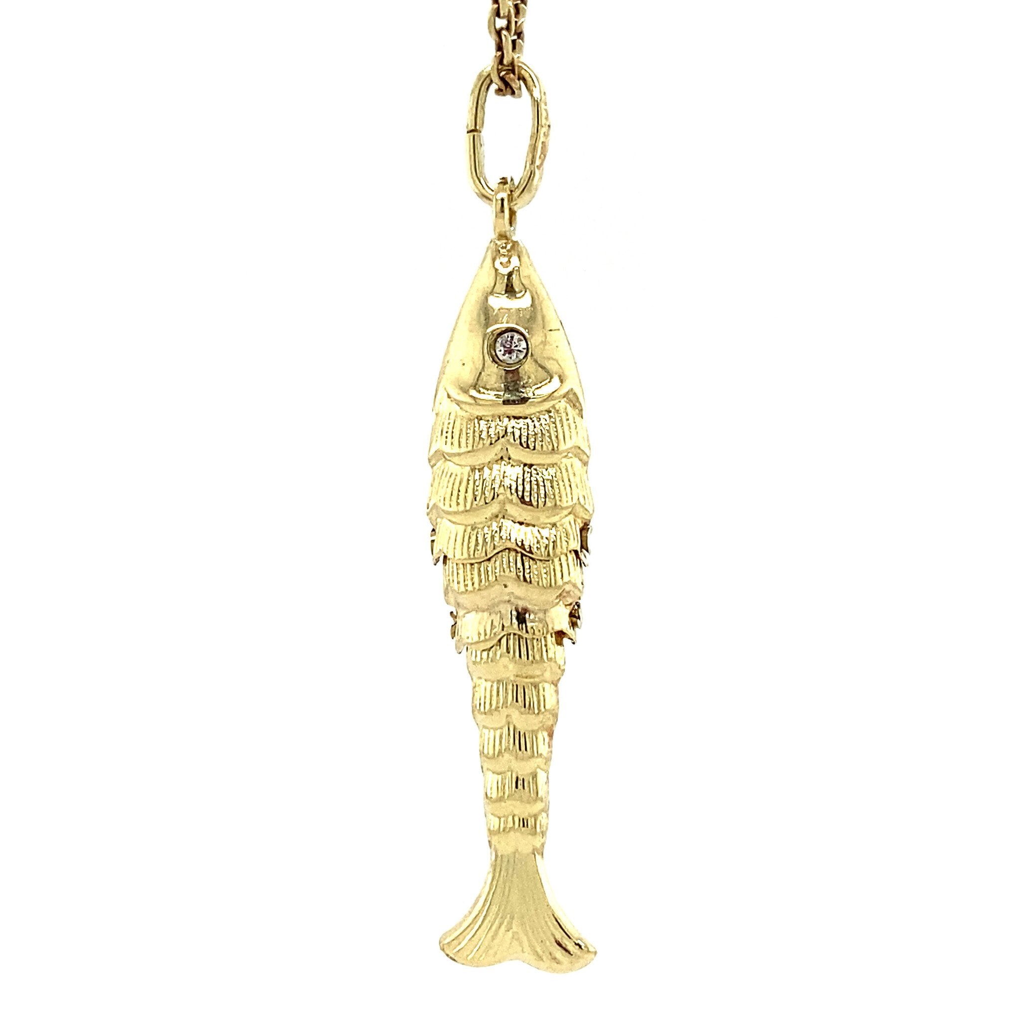 14 kt gold fish pendant with zirconia