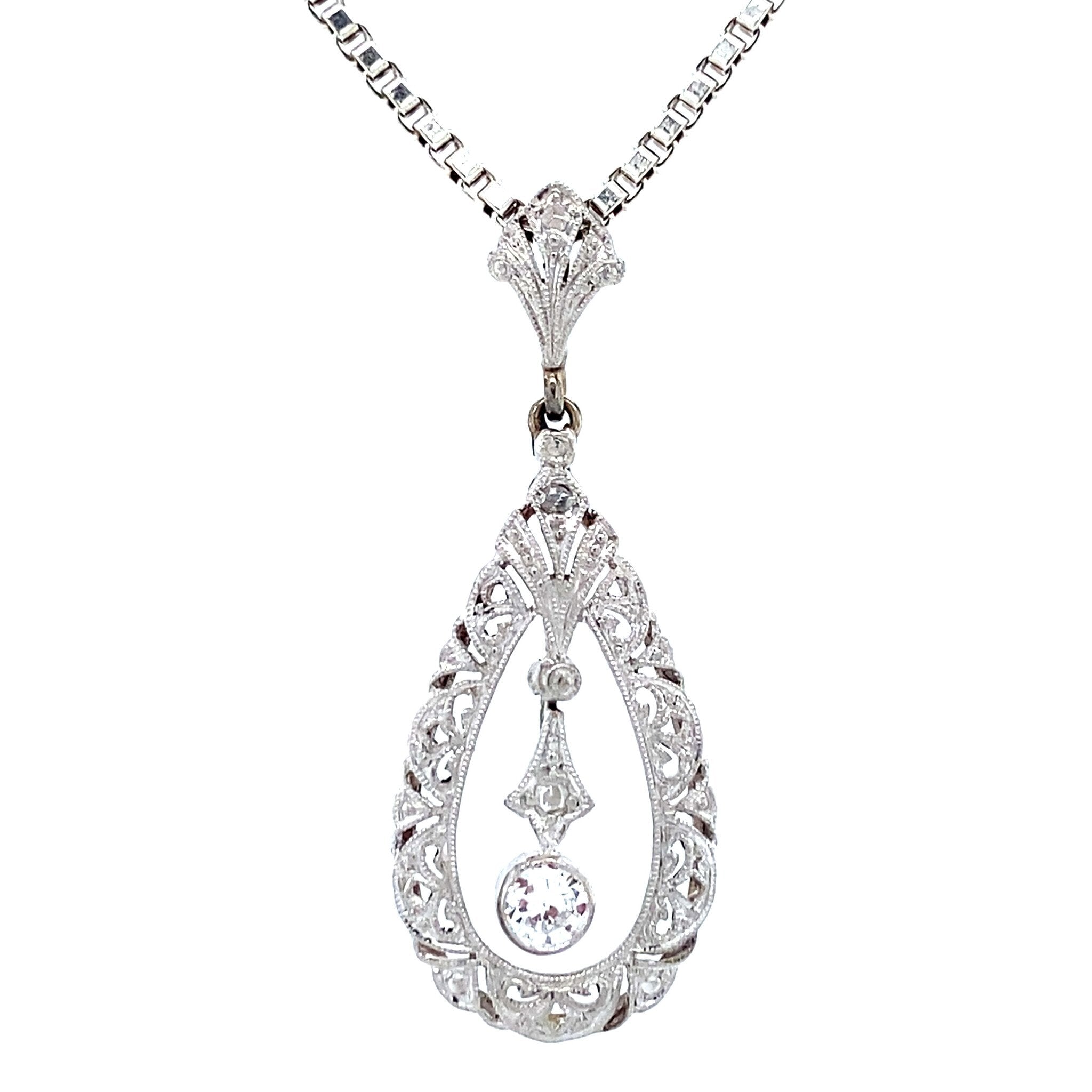 Witgouden vintage hanger met diamant 14 krt