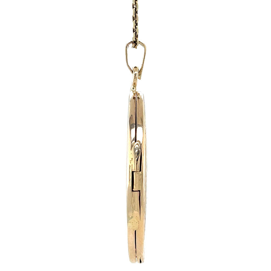 Vintage 18 kt gold locket with engraving