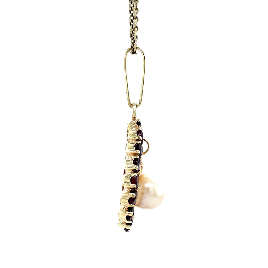 Gouden vintage hanger met parel en granaat 14 krt