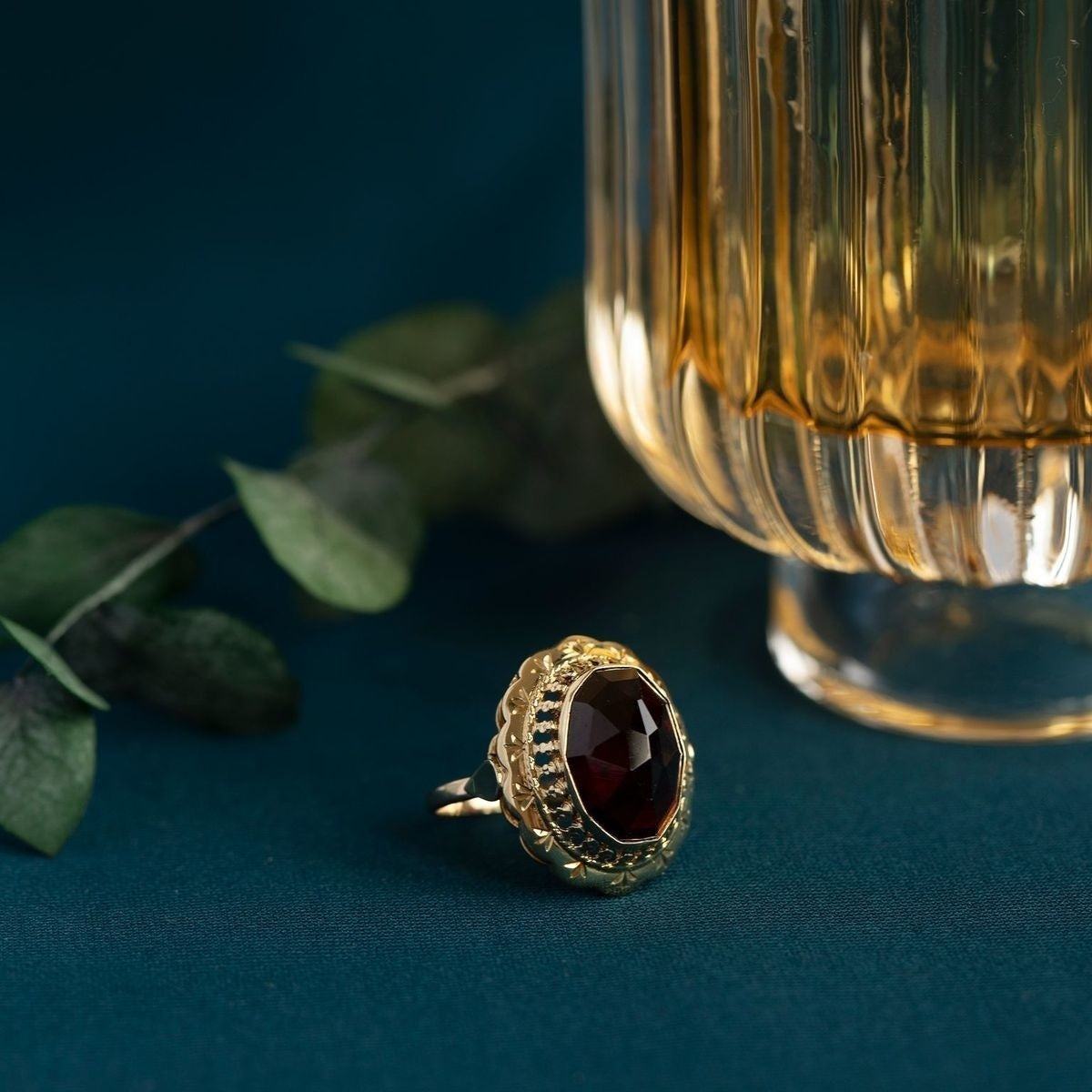 Gold ring with garnet, 14 kt