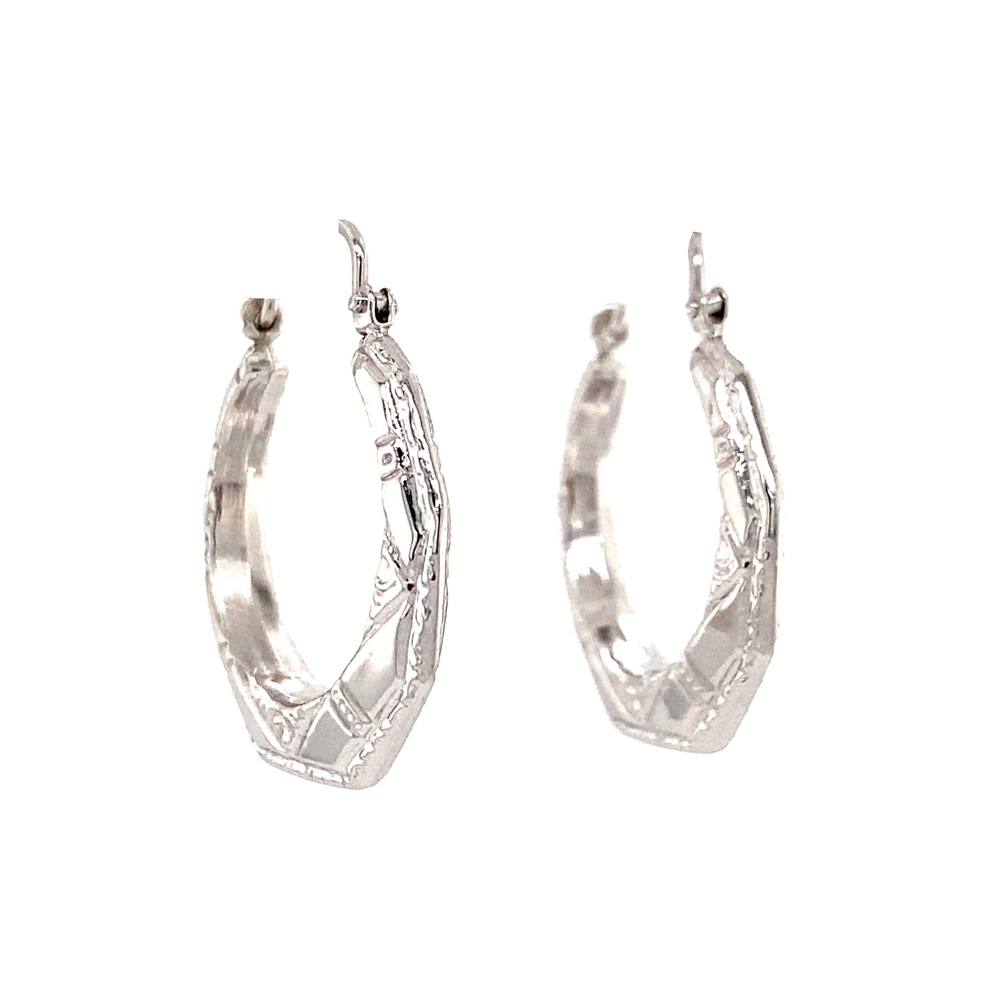 14 kt white gold fancy earrings