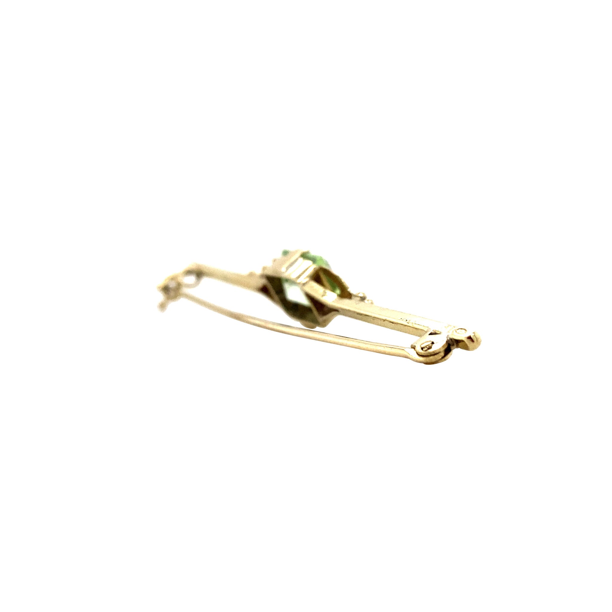 Gouden broche met groene spinel 14 krt