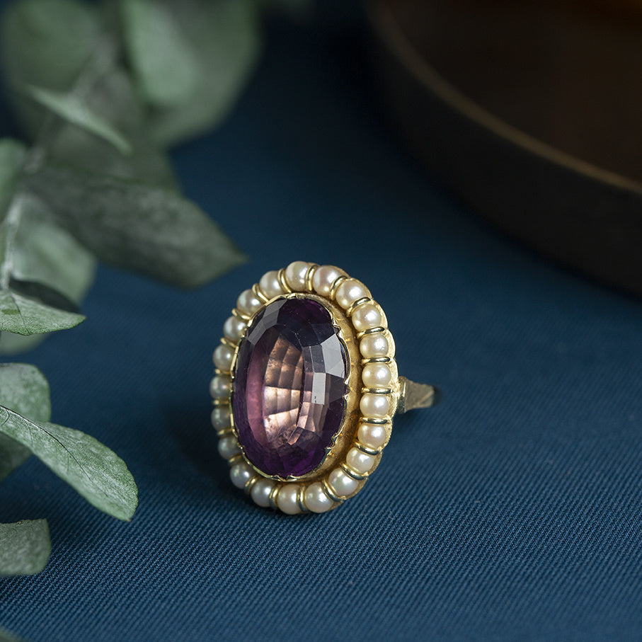 14 kt gold halo ring with amethyst and pearl