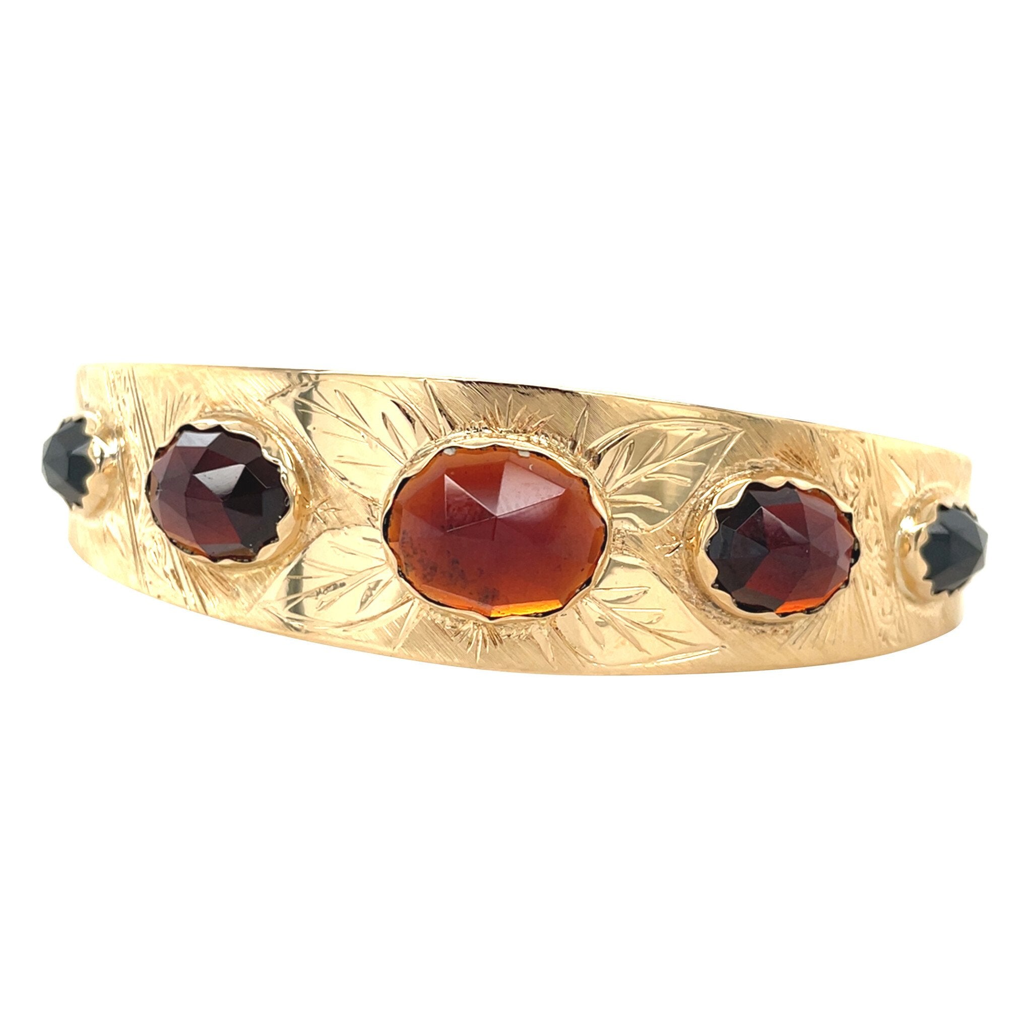 Gouden vintage bangle met granaat 14 kt