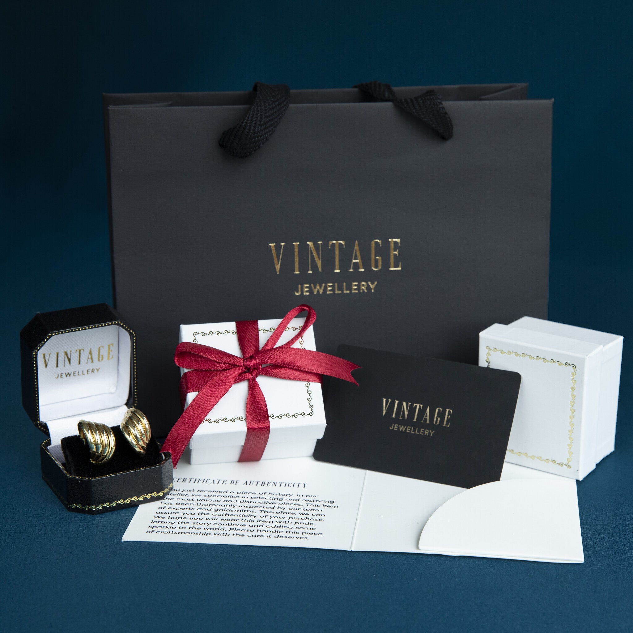 Witgouden vintage oorringen met saffier en diamant 18 krt