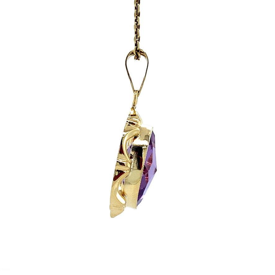 Gouden vintage hanger met saffier 14 krt
