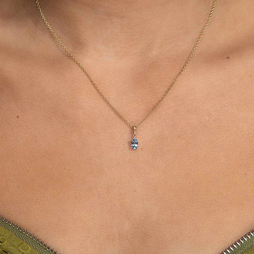 Hanger met topaas en diamant 9 kt