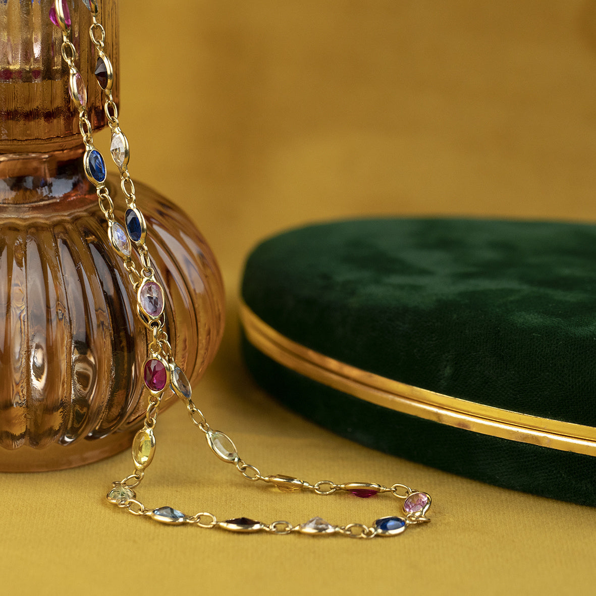 Gold necklace with spinel, sapphire, ruby and garnet, 18 kt