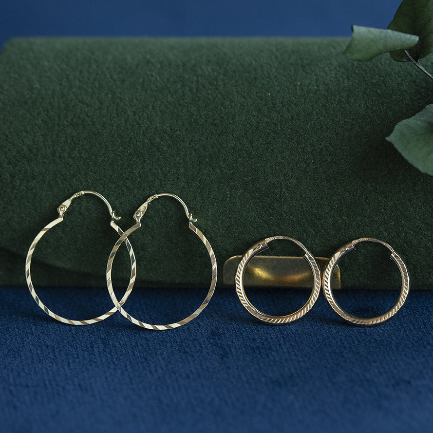 Gouden vintage fantasie oorringen 14 kt