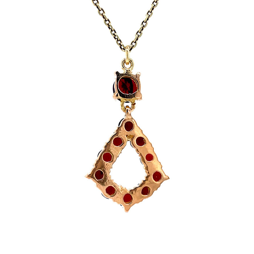 Golden vintage pendant with garnet 18 kt