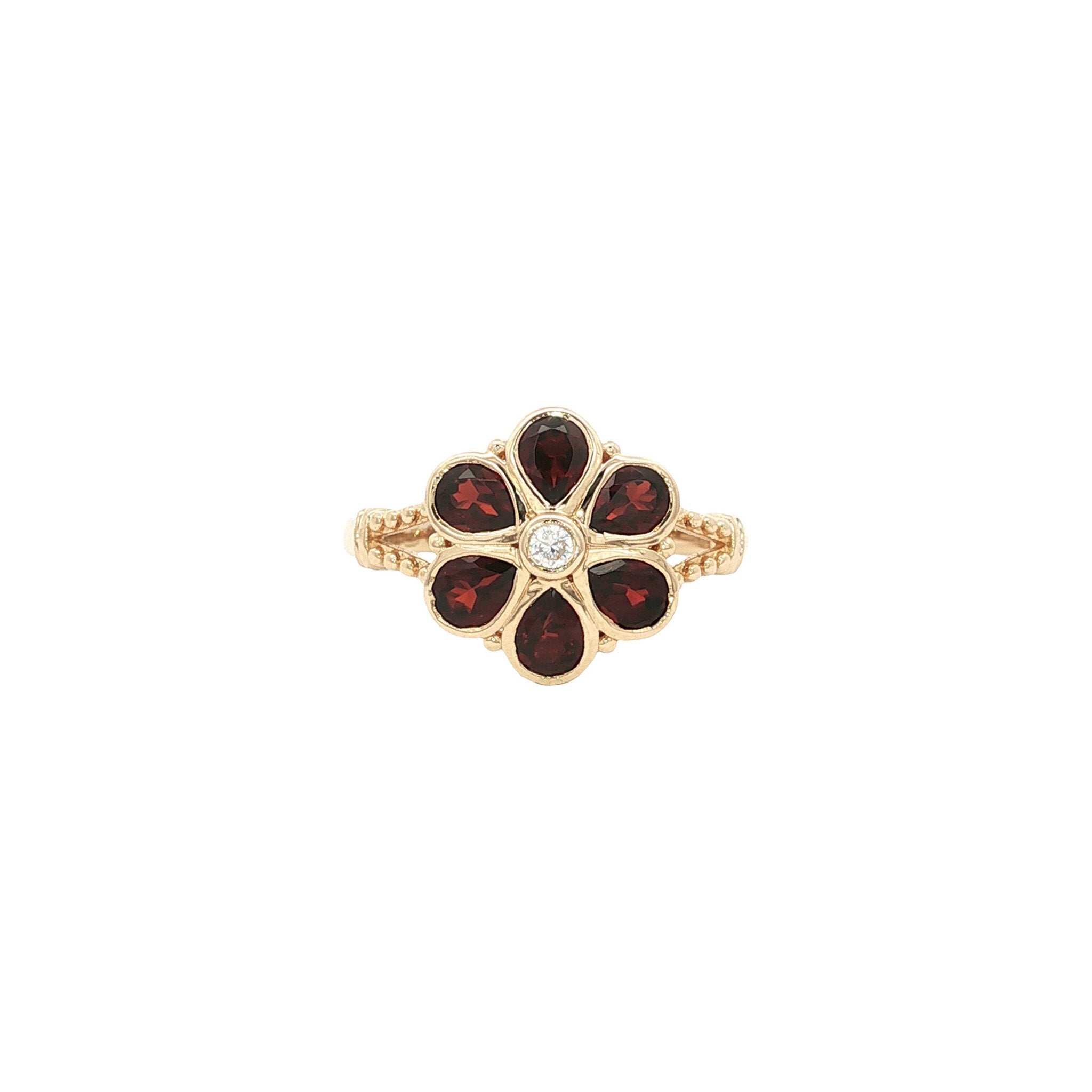 Gouden ring met diamant en granaat 14 kt