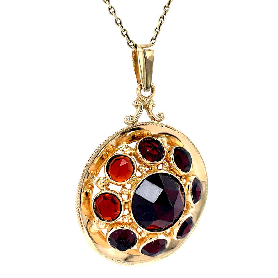 Vintage gold pendant with garnet 14 krt