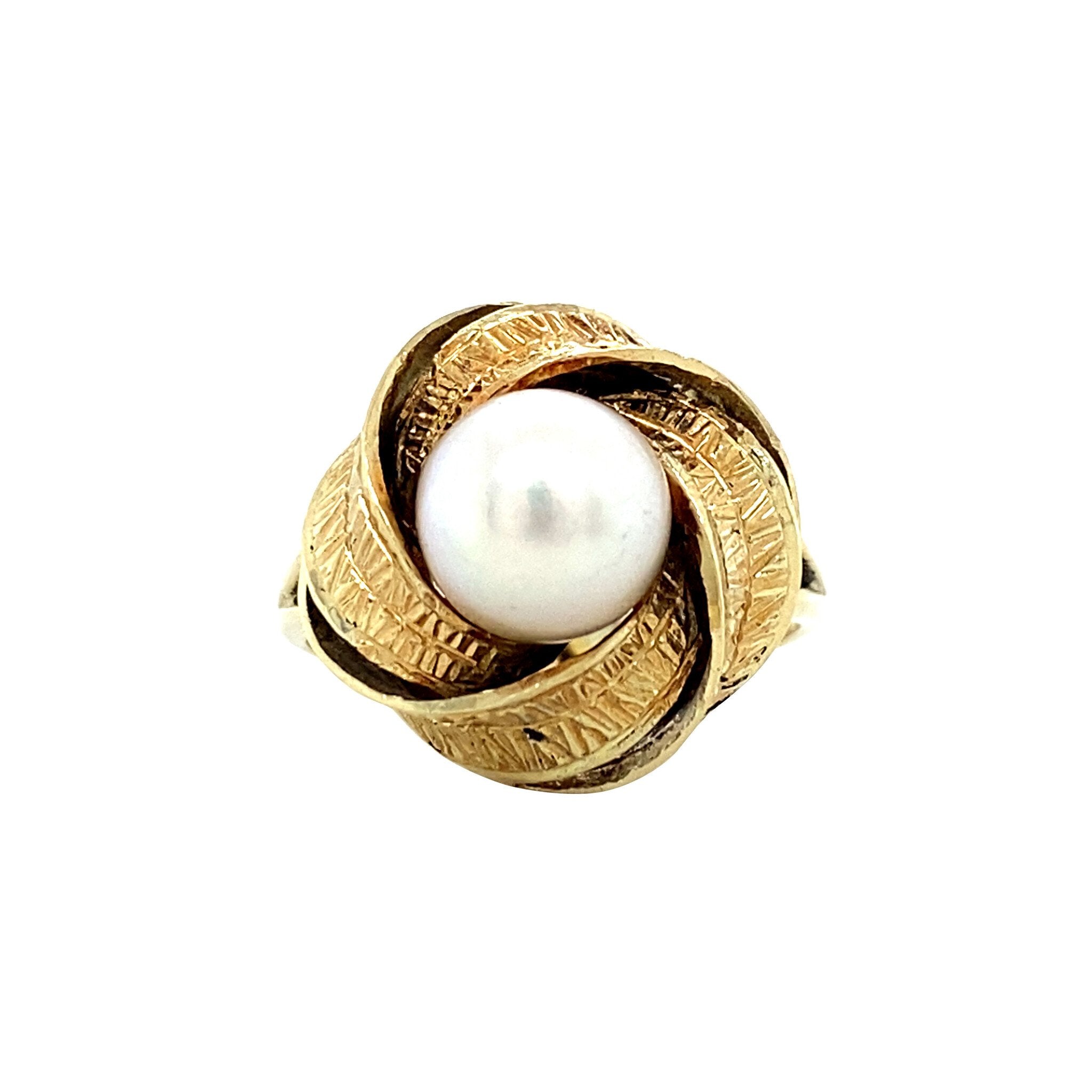 14 kt gold ring with pearl