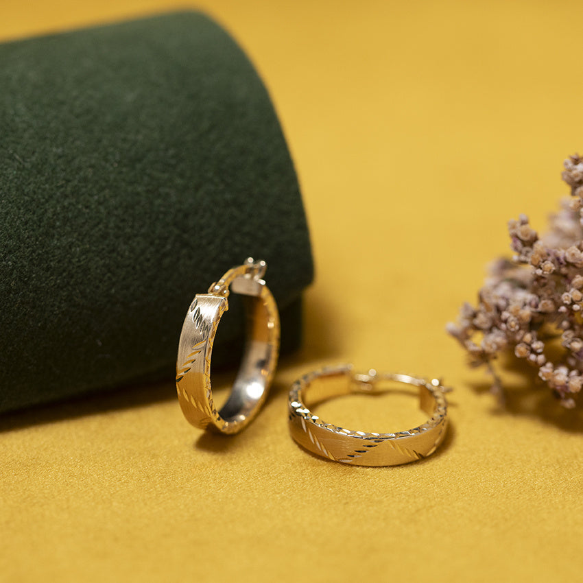 Gouden vintage fantasie oorringen 14 kt