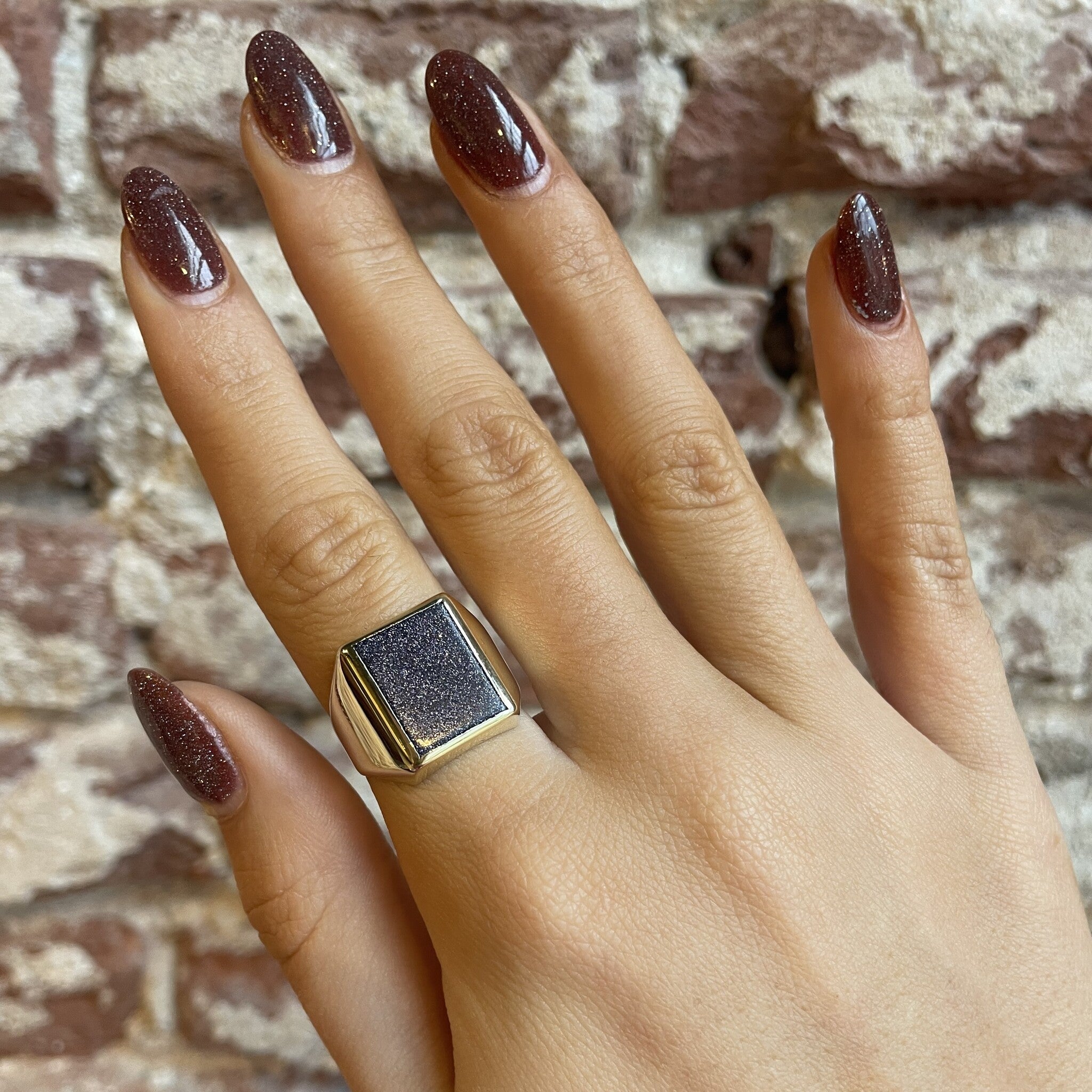 14 kt gold ring with goldstone