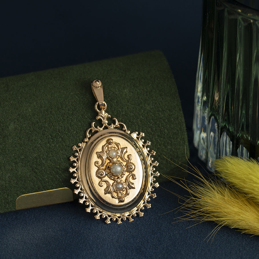 Gouden vintage hanger met parel 18 krt