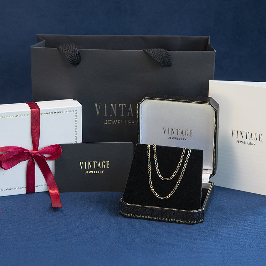Two-tone gold vintage Figaro necklace 14 kt