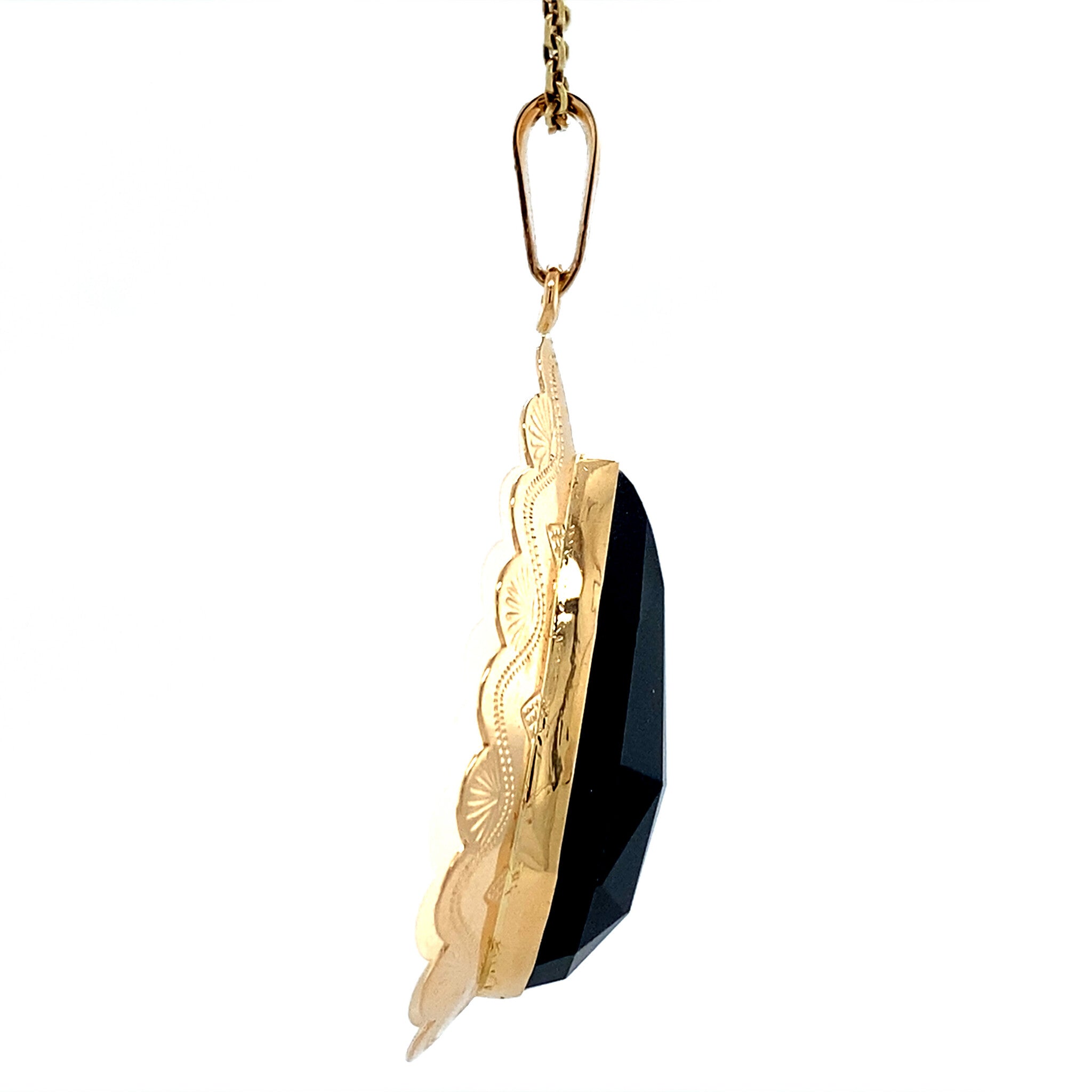 Vintage gold pendant with garnet, 14 kt
